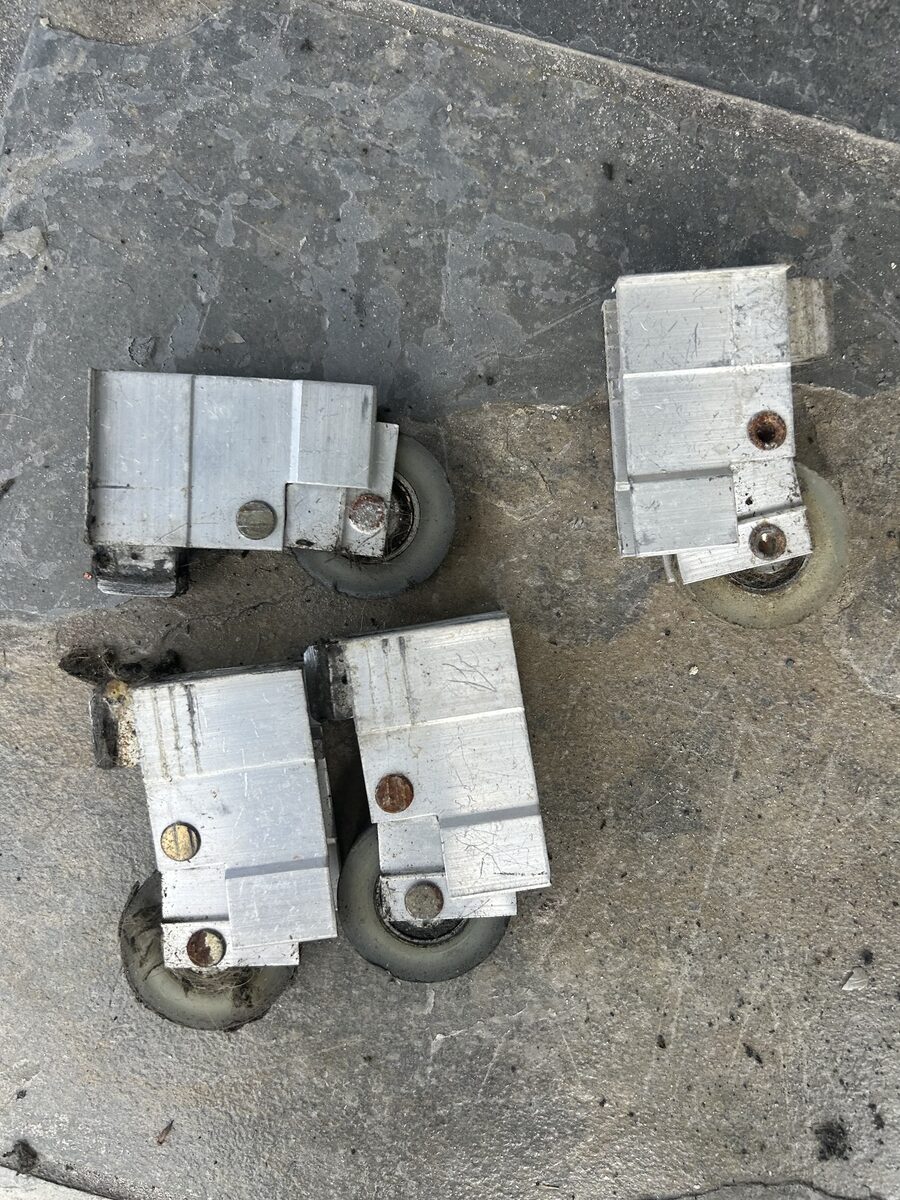 Worn rollers make the door drag and feel heavy.